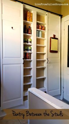 an empty pantry with lots of shelves in it