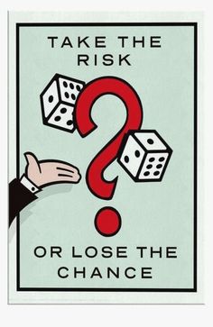 a sign that says, take the risk? and has two dices coming out of it