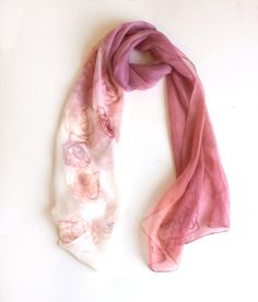 "Rose Ombre Silk Scarf. Pastel Pink Silk chiffon scarf painted, Long fashion scarf, Lightweight scarf, Pink scarf, Roses scarf, Floral scarves' Birthday gift for mom, gift for her Silk chiffon scarf painted in white to pink gradation. ♥ measurements- 17\"x 70\" ♥this scarf is painted on pure silk chiffon ♥MOre Chiffon Scarves painted by me: https://www.etsy.com/shop/klaradar?ref=hdr_shop_menu&section_id=18982789 ♥Felted Scarves: https://www.etsy.com/shop/klaradar?ref=hdr_shop_menu&sectio Pink Hand-dyed Scarf, Floral Scarves, Silk Chiffon Scarves, Velvet Scarf, Hand Painted Scarves, Painted Scarf, Floral Silk Scarf, Pink Scarf, Silk Scarf Painting