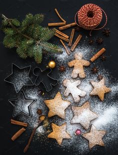 christmas cookies and spices on a black background