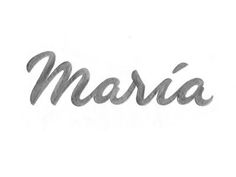 the word masia written in cursive writing on a white paper with black ink