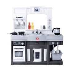 a toy kitchen with sink, oven and microwave