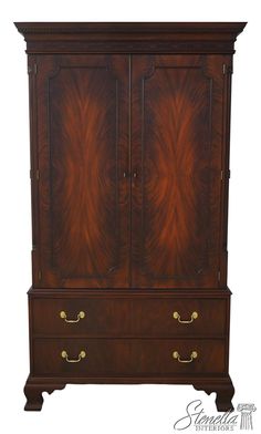 an armoire with two doors and drawers