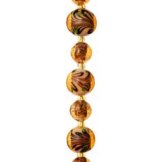 a glass beaded necklace on a chain with gold and brown beads hanging from it's end