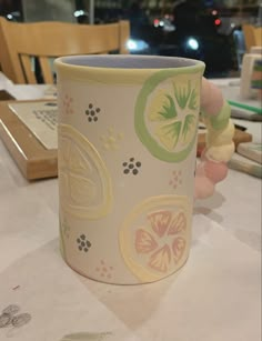 a coffee cup sitting on top of a table