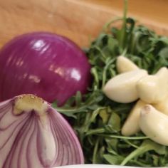 an onion and some other vegetables on a table