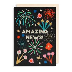 an greeting card with fireworks and the words amazing news written in white ink on black paper