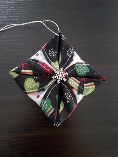 an ornament made out of fabric on a table