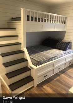 there is a bunk bed with stairs to the top and bottom beds on both sides