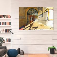 a painting hanging on the wall in a living room