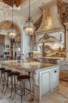 a large kitchen with marble counter tops and an island in front of two ovens