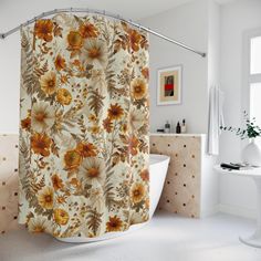 a bathroom with a flower shower curtain next to a bathtub