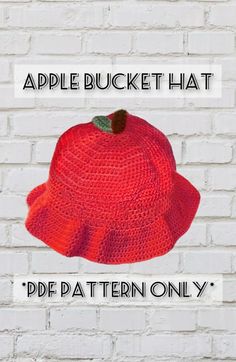 a red hat with an apple on it and the words apple bucket that'd be pattern only