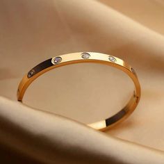 Brand New Stainless Steel Yellow Gold Hinge Closure Must Bundle For Deal Search Items With Or Low To High To Find My 4/$20 Gold Bangle With Stone, Elegant Gold Bangles, Gold Kada For Women Classy, Rose Gold Kada Design For Women, Unique Bangle Designs Gold, Unique Gold Bracelet Designs For Women, Kada Designs Gold For Women Antique, Gold Bangle For Women Classy