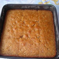 a square cake in a pan on a table