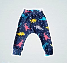 Harem Style Pants for your Baby or Toddler. These are not only cool and trendy but also baggy, stretchy and super comfy for the ever growing and playful child :)   🌟FABRIC: Galactic Dinosaurs in Space and Constellations on Dark Blue Stretch Knit Cotton. LENGHT OPTIONS: Please Choose: a. LONG: To the Ankle b. CROPPED: Below Knees * Want a 15% OFF Discount on your Order?   Please Sign up & Get our VIP Secret Coupon here: http://bit.ly/COOLCATANDBEAR * Shop with confidence, I am a long time Etsy-e Beetlejuice Costume, Space Baby, Boy Toddler, Baby Christmas Outfit, Baby Jogger, Mesh Laundry Bags, Holiday Baby, Baby Pants, Space Theme