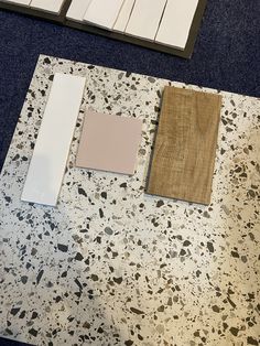 the flooring materials are laid out on top of each other