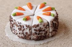 there is a cake with carrots on it