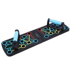 a black and blue game board with neon colored circles on the top, and two rollers attached to it