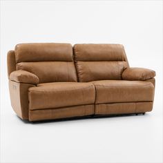 a brown leather reclining couch on a white background