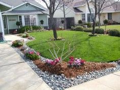 the front yard is clean and ready to be used as a landscaping area for this home