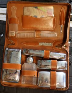 Vintage leather grooming kit including mirror, shoe horn,tweser,comb,file,bursh,and 3 chrome containers for things like toothpaste and colone bottle. Very nice vintage condition All leather case. axx Travel Cases, Guy Stuff, Shoe Horn, Mens Shaving, Leather Wallets, Grooming Kit, Toiletry Storage, Leather Wallet Mens, Gentleman Style