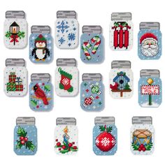 cross stitch christmas magnets are arranged in rows