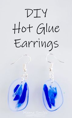 a pair of blue earrings with the words diy hot glue earrings written on it