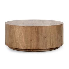 a round wooden table with a white background