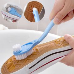 a person holding a toothbrush in their right hand and brushing it on the other