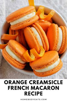 orange creamsice french macaron recipe in a bowl with text overlay