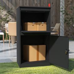 an outdoor storage cabinet with cardboard boxes in it