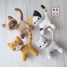 crocheted cats and kittens are arranged on a white wooden surface with the words no sew above them