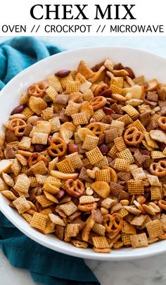 a white bowl filled with cheetos and pretzels