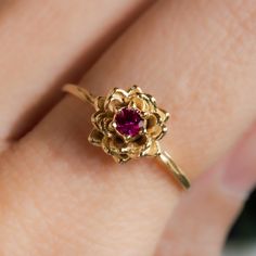 Water lily Flower Ring * July Ruby Birth Flower Ring * 14k Gold Plate Celebrate July birthdays with our exquisite Water Lily Flower Ring, a beautiful tribute to the July birth flower. The water lily symbolizes purity, enlightenment, and rebirth, making it a meaningful and elegant choice. Paired with the vibrant Ruby, the July birthstone known for its passion and protection, this 14k Gold Plated ring is perfect as a birthflower ring or a remembrance ring. Embrace the unique significance of the water lily and ruby, and honor your loved ones with this stunning piece of jewelry. Material: 14K Gold Plate Timeline: Ships right away! Stone: 3 mm Imitation Ruby Packaging: All items are nicely packaged and ready to gift in lovely jewelry boxes. The jewelry boxes are reusable and recyclable Backgrou Water Lily Ring, Monet Wedding, Lotus Flower Jewelry, Water Lily Flower, July Birth Flower, Lily Ring, Element Water, Ring Ruby, Jewelry Chest