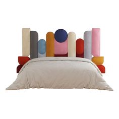 an upholstered bed with colorful pillows on the headboard and foot board, in front of a white background