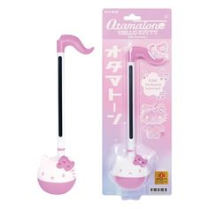 the hello kitty umbrella is pink and has a black handle with a white cat on it