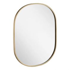 an oval mirror with a gold frame