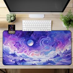 a computer desk with a purple and blue painting on the mouse pad next to a keyboard