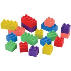 many different colored lego blocks on a white background