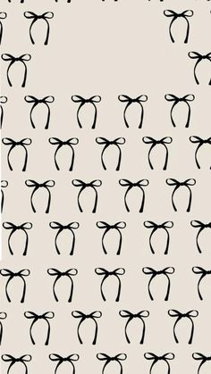 black and white pattern with bows on it