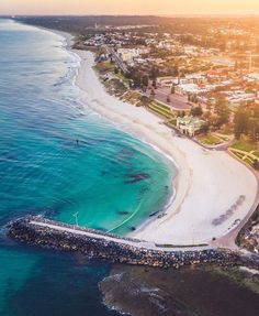 an aerial view of the beach and ocean