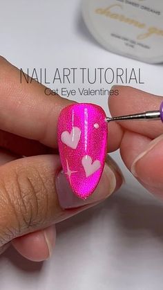 Pink Cats Eye Nails Design Ideas, Valentines Cateye Nails, Valentines Cat Eye Nails, Cats Eye Heart Nails, Valentines Cats Eye Nails, Cat Eye Valentines Day Nails, Hot Pink Cat Eye Nails, Cat Eye Nails Polish Pink, Red Cat Eye Valentines Nails