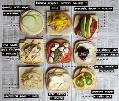 an assortment of sandwiches with different toppings on top of newspaper paper, including apple slices and pickles