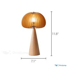 a wooden lamp sitting on top of a table