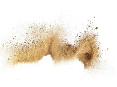 an image of sand flying in the air on a white background with space for text