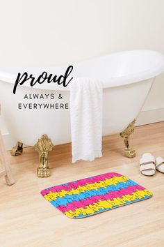 a bathroom with a bathtub, rug and shoes on the floor next to it