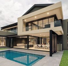 a large modern house with a swimming pool