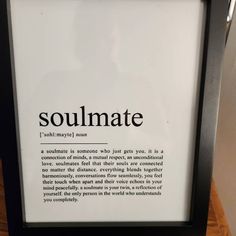 a black frame with the words soulmate on it