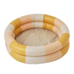 an inflatable swimming pool is shown on a white background, with yellow and pink stripes